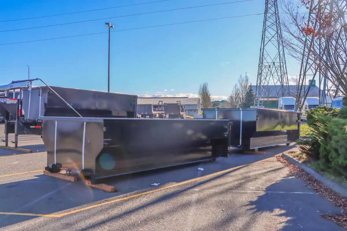 Roll-off dumpster ready for waste disposal at job site for Construction Dumpster Rental in Hugo